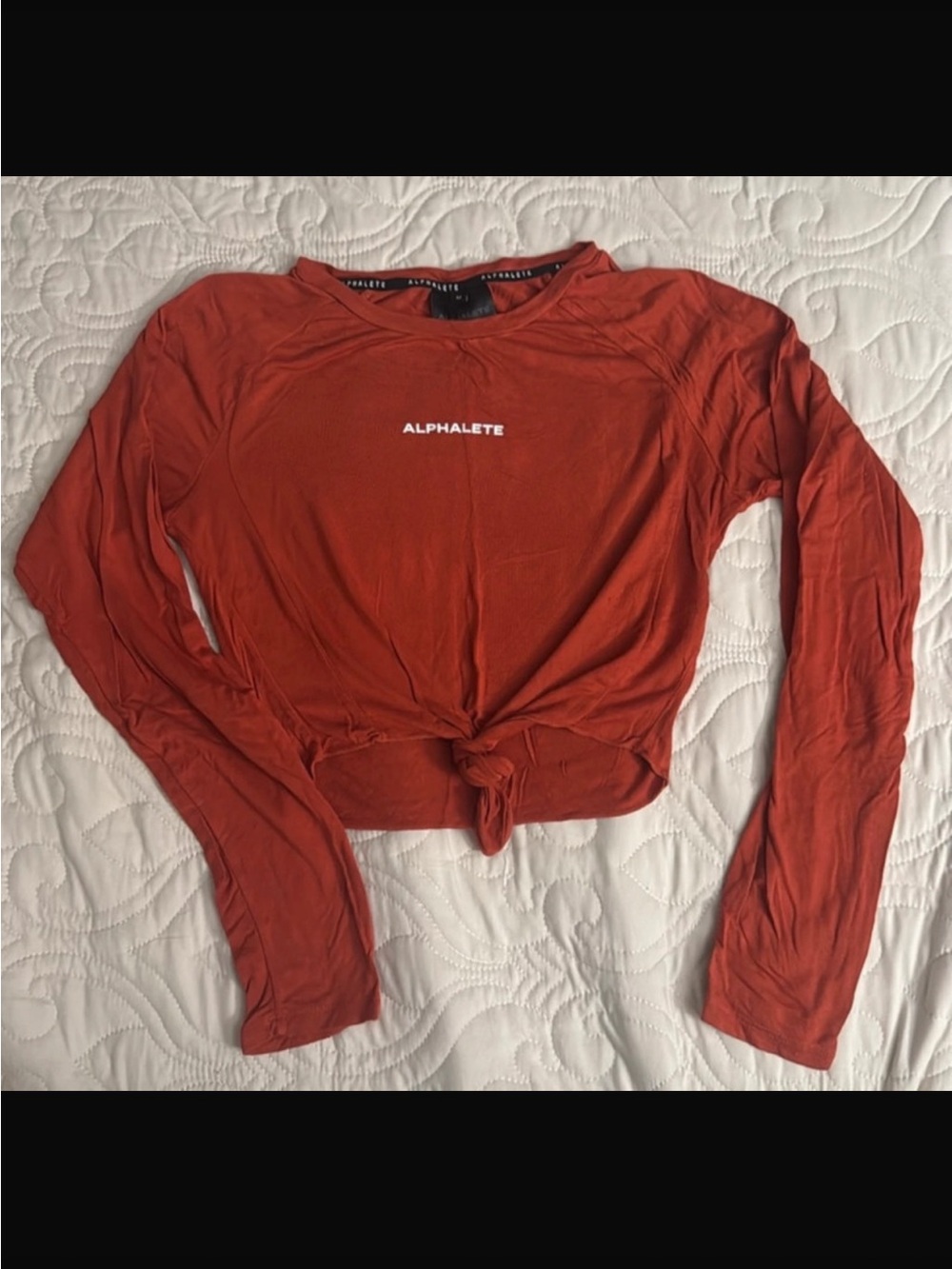 Alphalete Long Sleeve Cropped Tie-Front Top in Rust